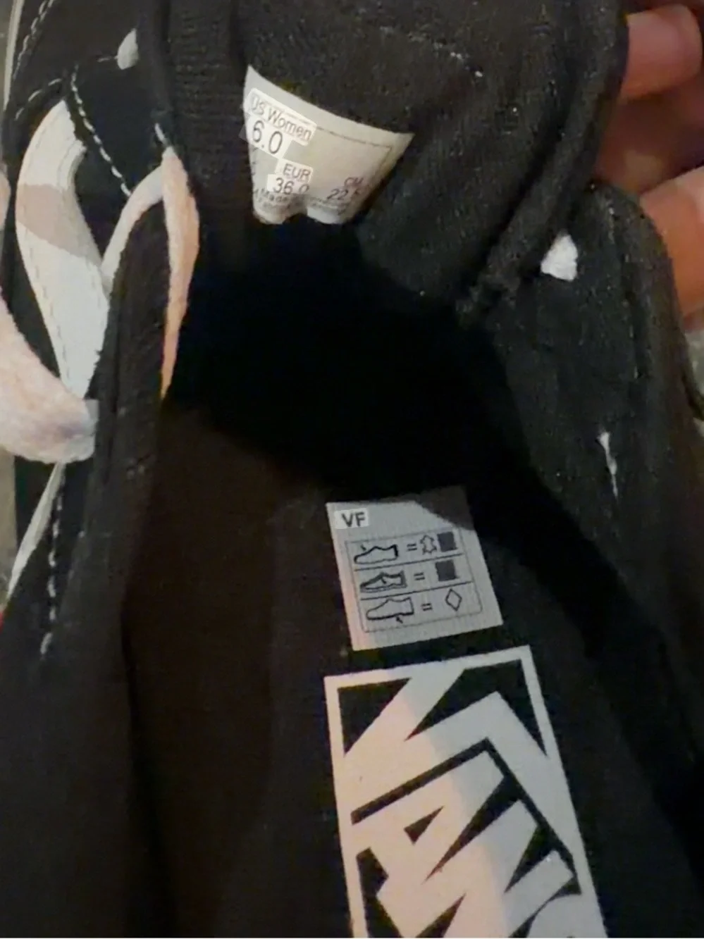Vans women’s Black & White Low-Top Sneakers